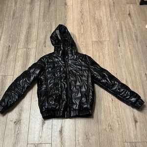Black “puffer coat”